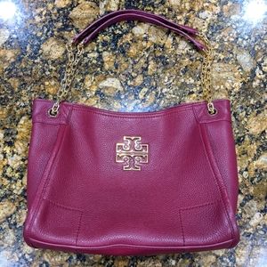 Tory Burch red wine color all leather hand bag or crossbody make your style